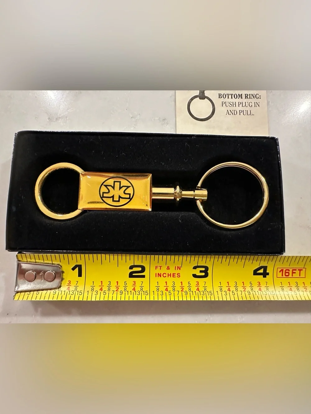 NEW Keyring - Kimberly-Clark logo (Brass)